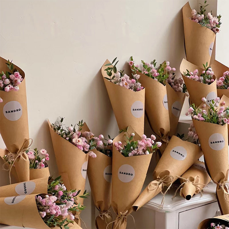 wrapping flowers with brown paper
