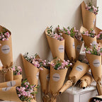 wrapping flowers with brown paper