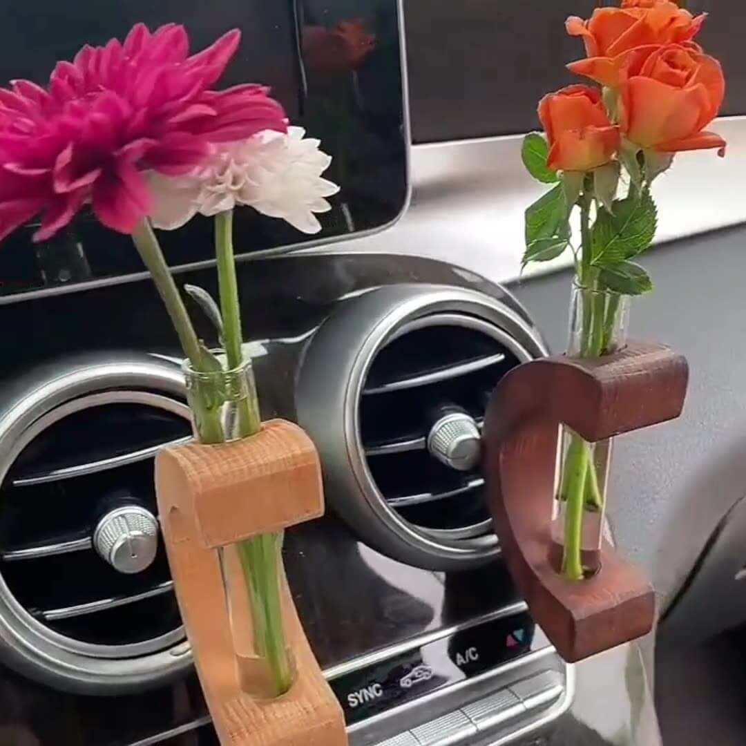 flowers in bud vases