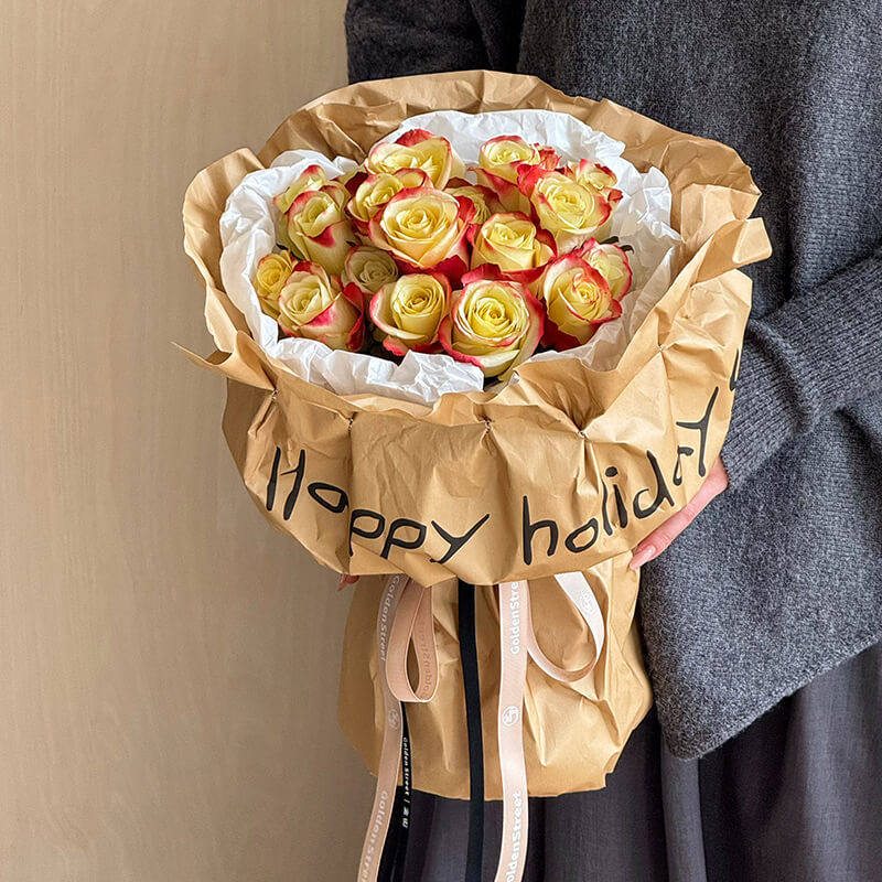 wrapping flowers in brown paper