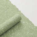 green and gold wrapping paper
