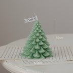 Vela perfumada con forma de árbol de Navidad