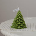 Vela perfumada con forma de árbol de Navidad