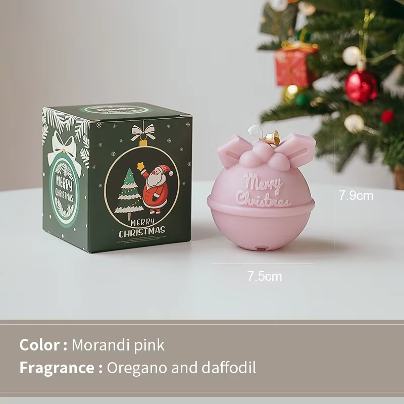 Velas con campanillas navideñas