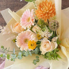 wrapping flowers in paper bag