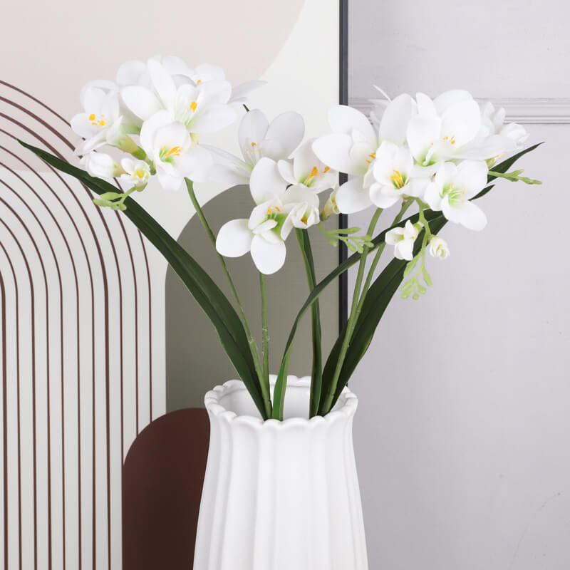 artificial flowers in vase