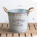 flowers in metal buckets