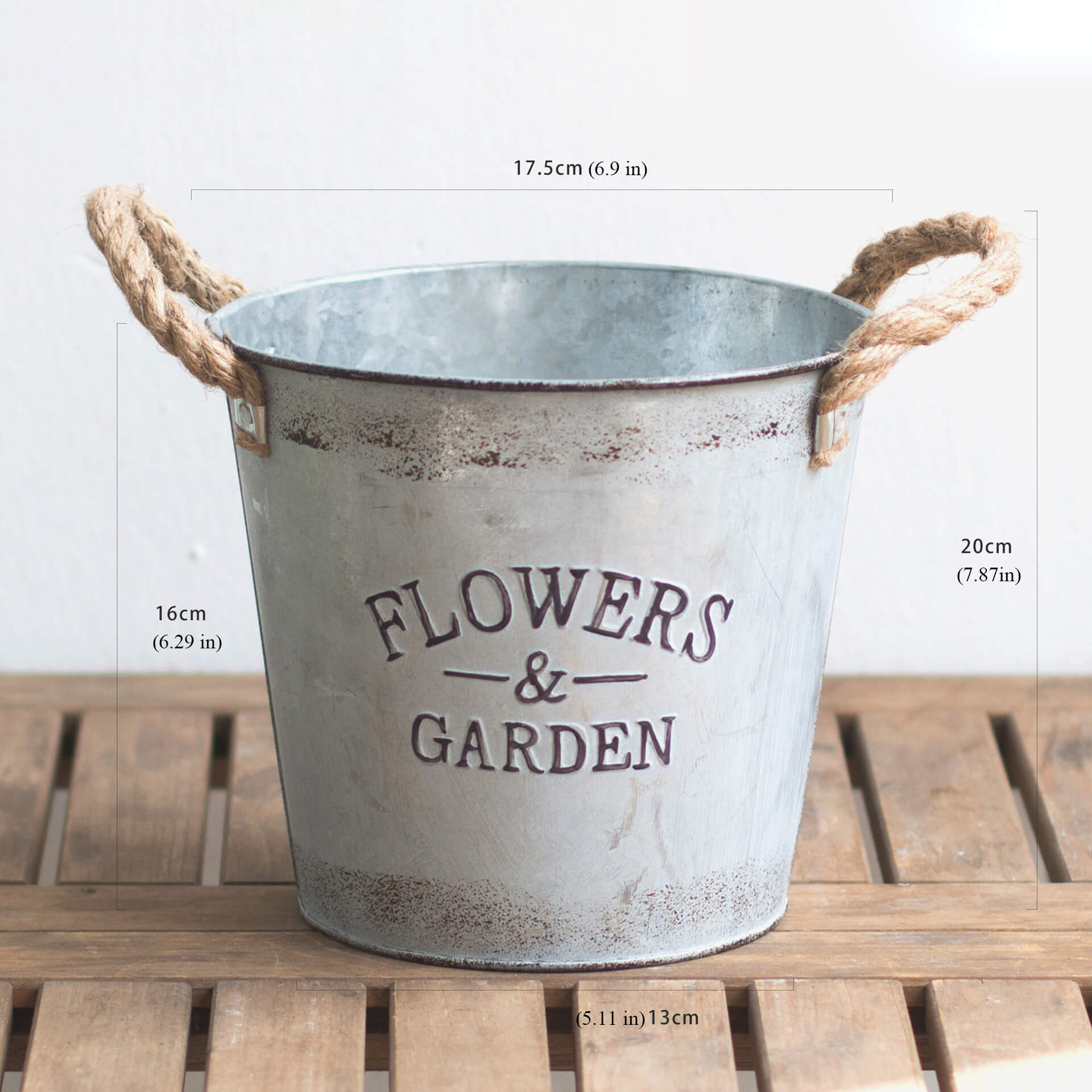 flowers in metal buckets