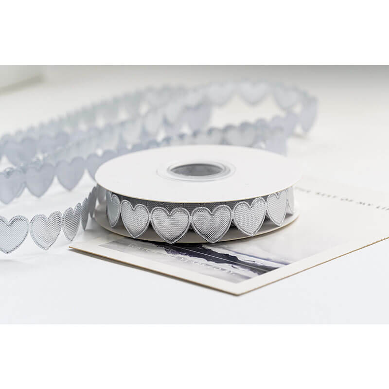 wrapping a gift with ribbon